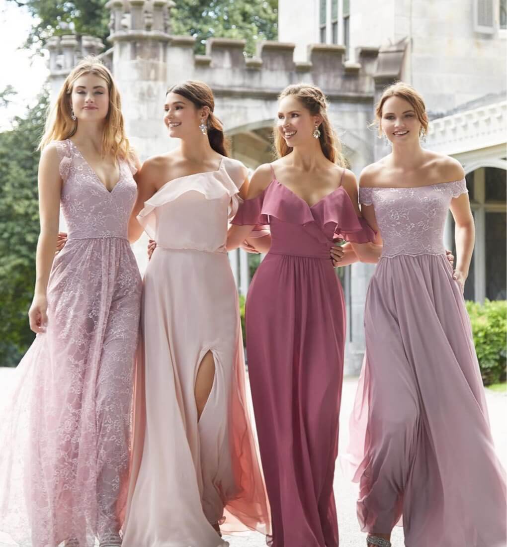 Bridesmaids wearing long pink dresses